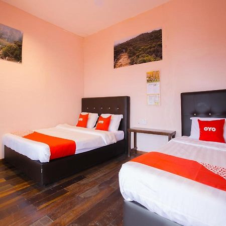 Oyo 90111 Happy Garden Hotel Tenompok Bagian luar foto