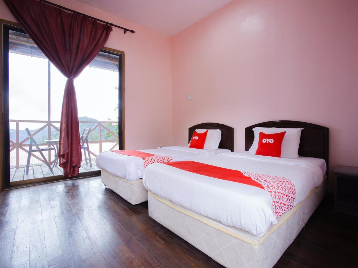 Oyo 90111 Happy Garden Hotel Tenompok Bagian luar foto
