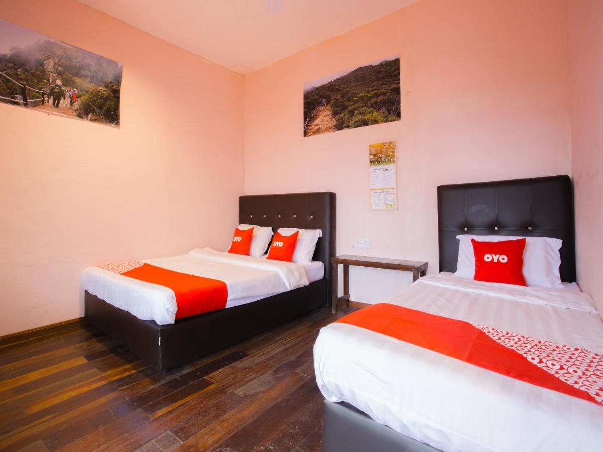 Oyo 90111 Happy Garden Hotel Tenompok Bagian luar foto